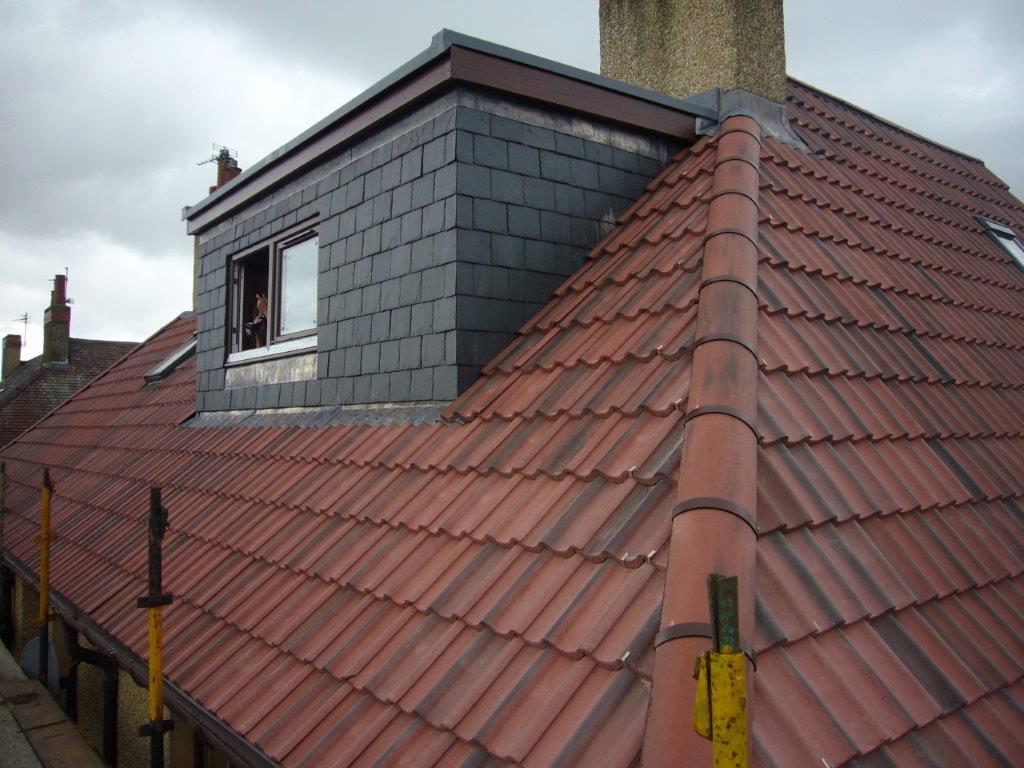 Dormer and roof replaced Dormer and roof replaced